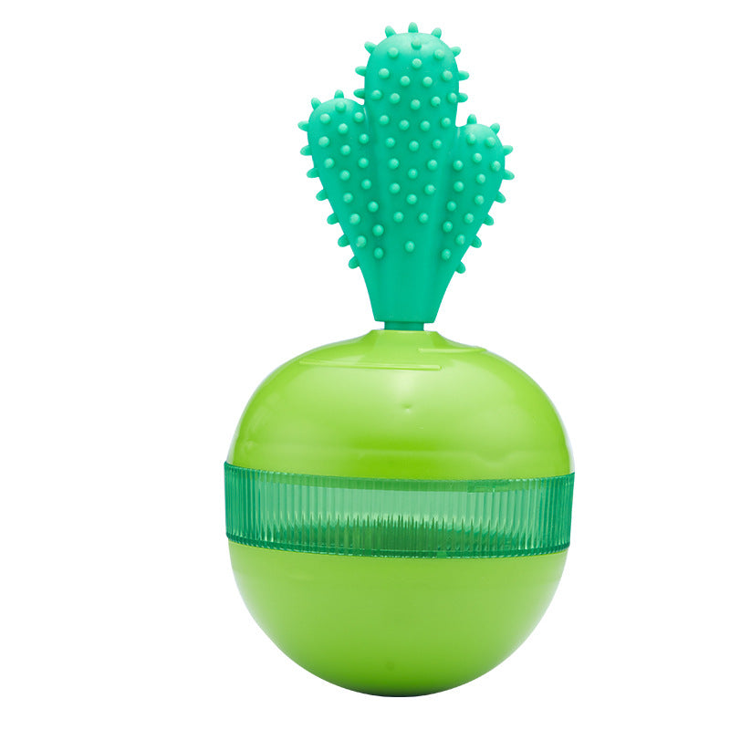 Green treat dispensing tumbler dog toy