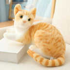 Cat plush toy in yellow color