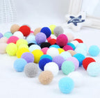 Cat toy balls shown in a pile