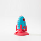 Rocket dog toy with food-leaking design