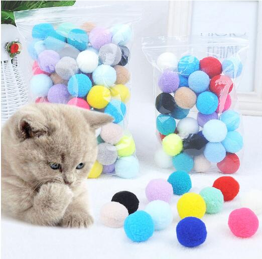 Plush cat toy ball compressed into nest shape