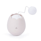 Cat knot toy with cotton ball detail
