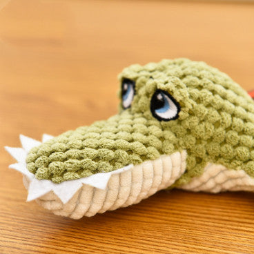 Plush crocodile dog toy close-up