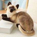 Cat plush toy in a sitting pose