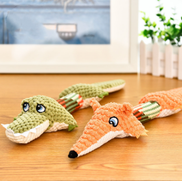Plush crocodile dog toy, side view