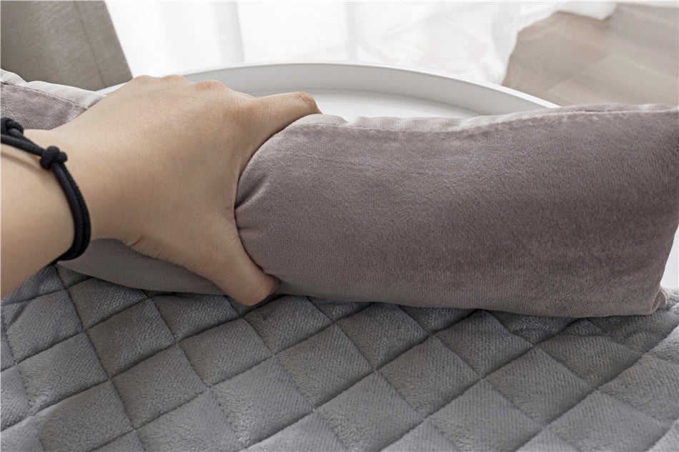 Plush curved dog sofa bed with pillow