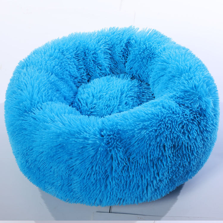 Round plush pet bed, top view showing plush texture