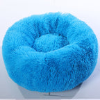 Round plush pet bed, top view showing plush texture