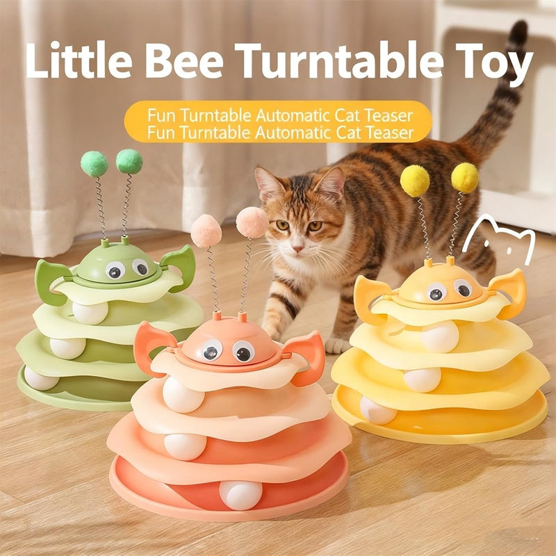 Close-up of the rotating bee topper on the cat toy tower