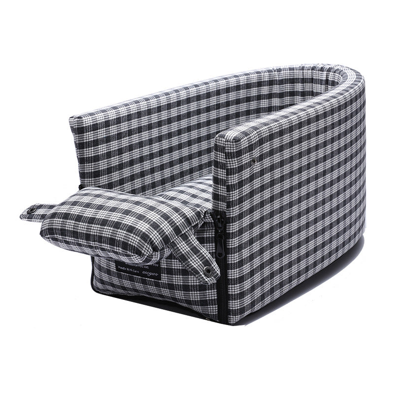Small dog or cat resting inside pet car armrest box kennel