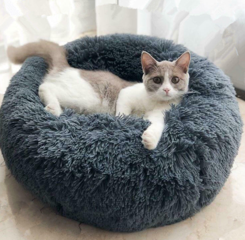 Plush pet bed shown in apricot color