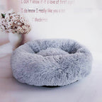 Round plush pet bed in an alternate color option