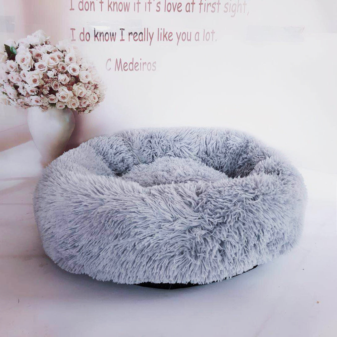 Round plush pet bed in an alternate color option