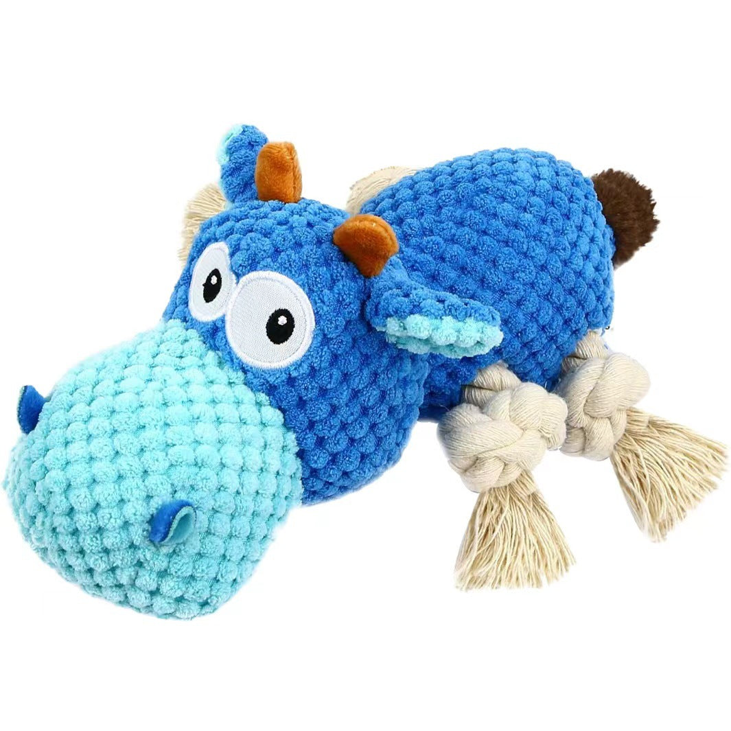 Large dog playing with plush squeaky toy