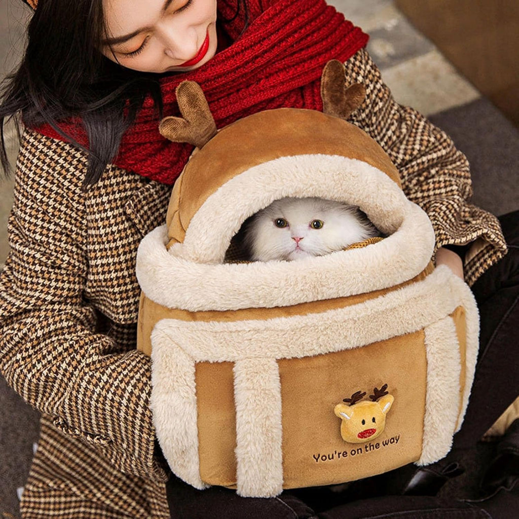 Plush reindeer backpack pet carrier, worn on back