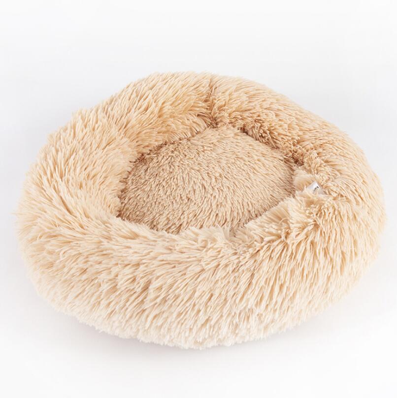 Round pet bed with soft plush texture